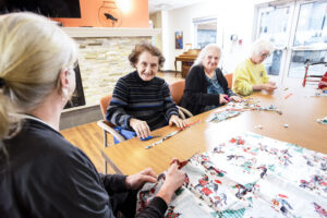 Social Day participants do art project